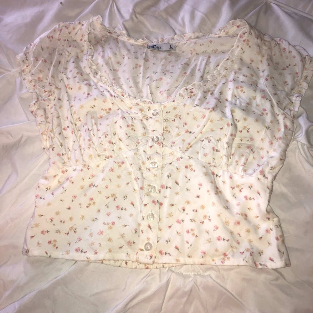 Hollister women’s size large floral blouse. New